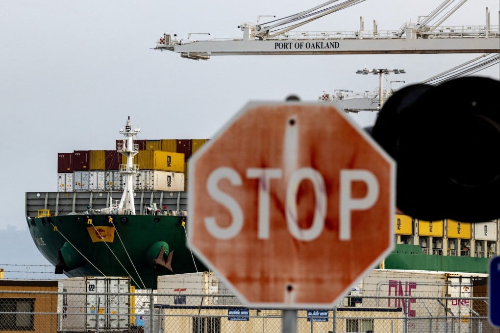 A cargo ship loaded with shipping containers is seen at the Port of Oakland in California, in February. Photo: Reuters