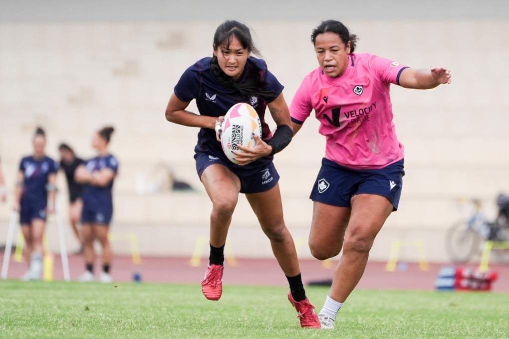 Au King-to (left) breaks clear during a training game against Canada at Hong Kong Sports Institute. Photo: Eugene Lee