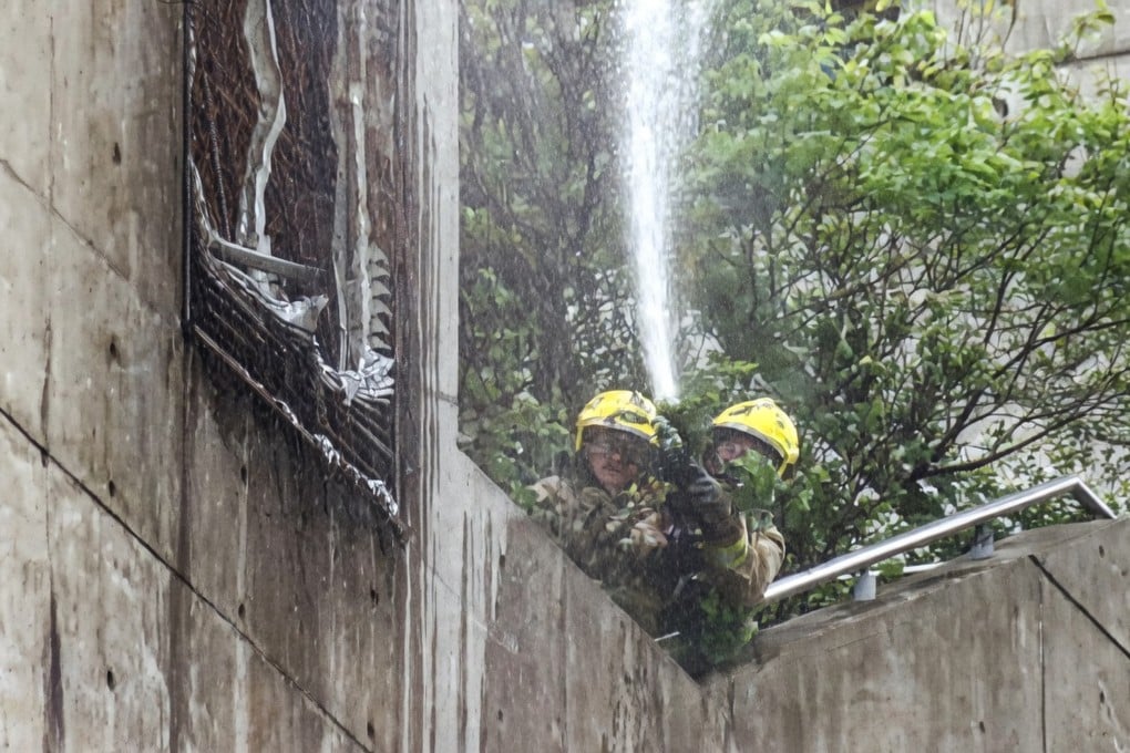 Firefighters at Diamond Hill Columbarium. Photo: Now TV News