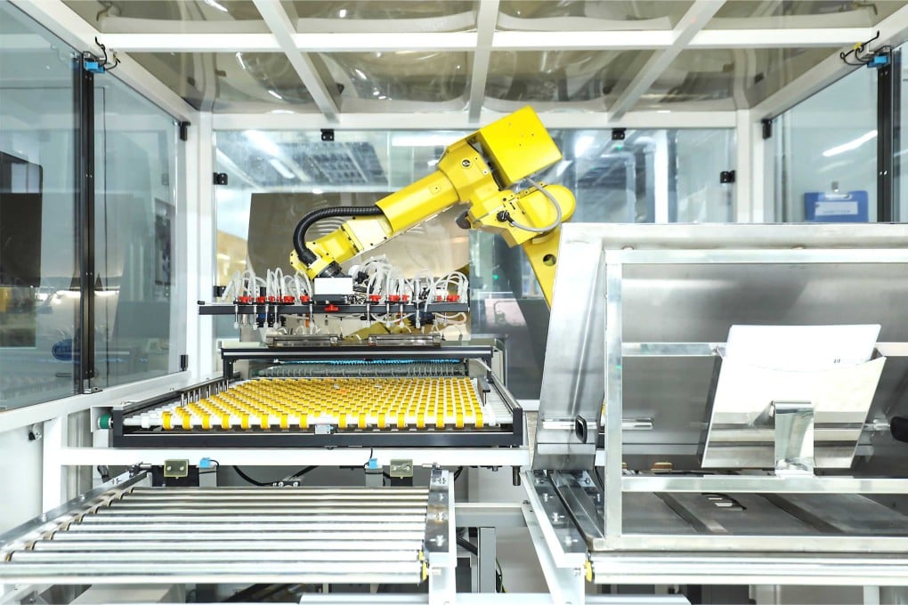 A robotic arm is seen in a factory of Victory Giant Technology. Photo: Handout