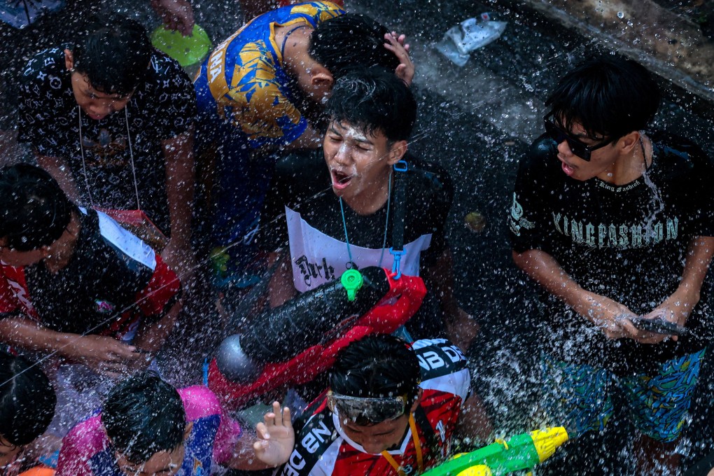 Revellers celebrate in Bangkok, Thailand, on Sunday, the eve of Songkran. Photo: Reuters