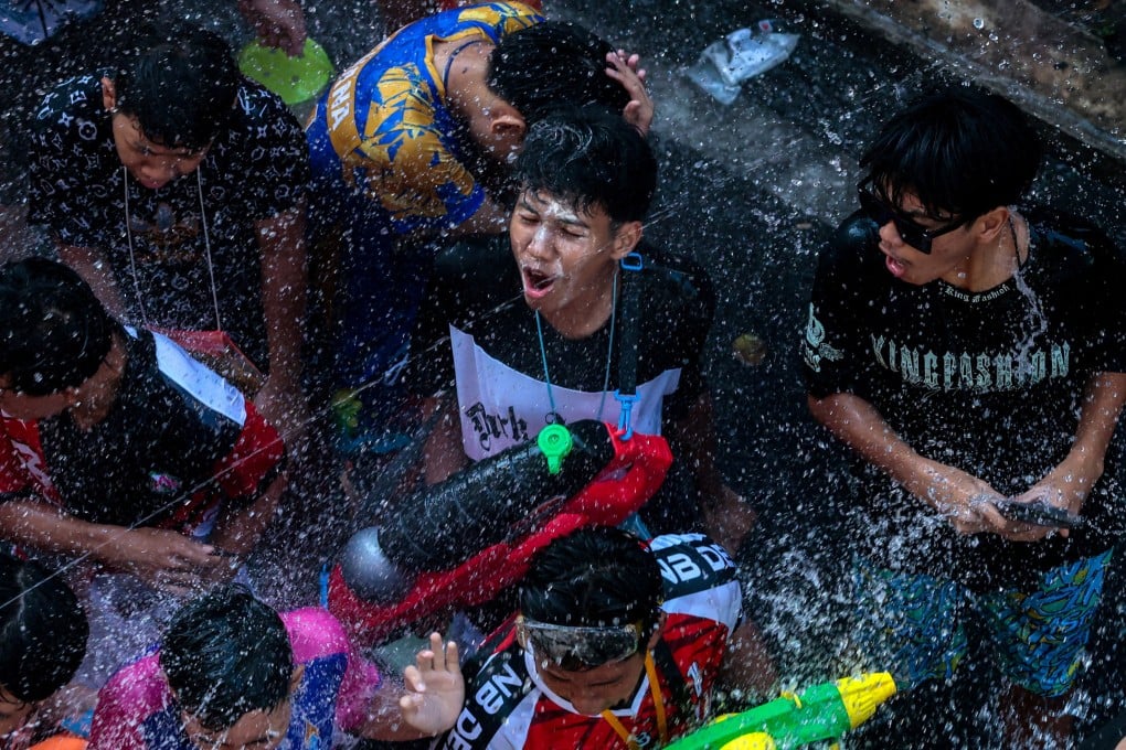 Revellers celebrate in Bangkok, Thailand, on Sunday, the eve of Songkran. Photo: Reuters