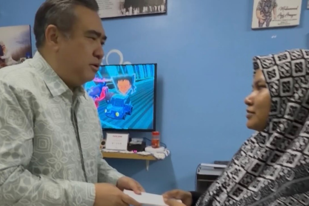 Transport Minister Anthony Loke visits family of motorcyclist killed in suspected drunk-driving incident. Photo: Handout