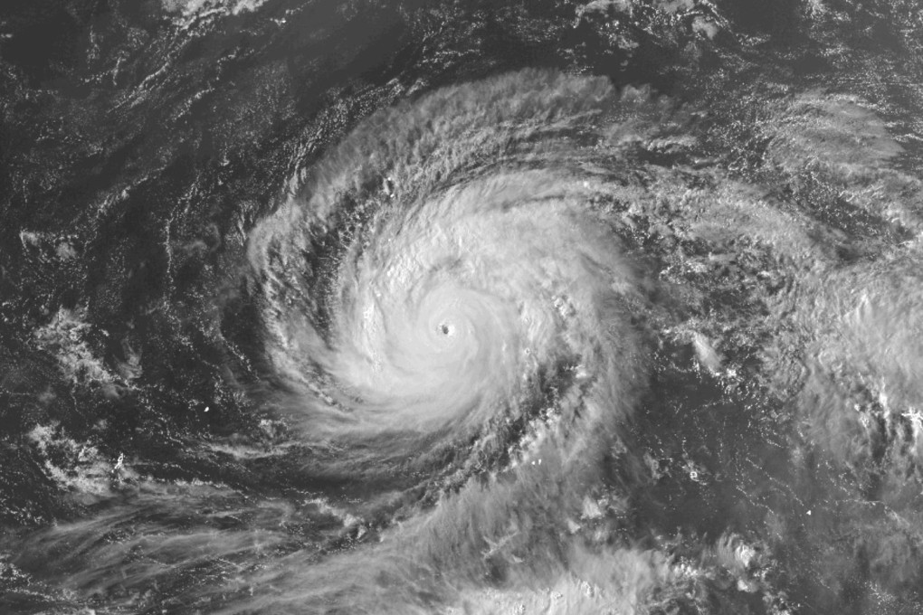 A satellite image provided by the National Oceanographic and Atmospheric Administration (NOAA) shows super typhoon Sinlakua in the Pacific Ocean on Monday. Photo: NOAA via AP