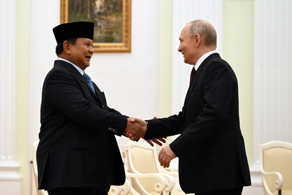 Russian President Vladimir Putin (right) shakes hands with Indonesian President Prabowo Subianto at the Kremlin in Moscow on Monday. Photo: AP