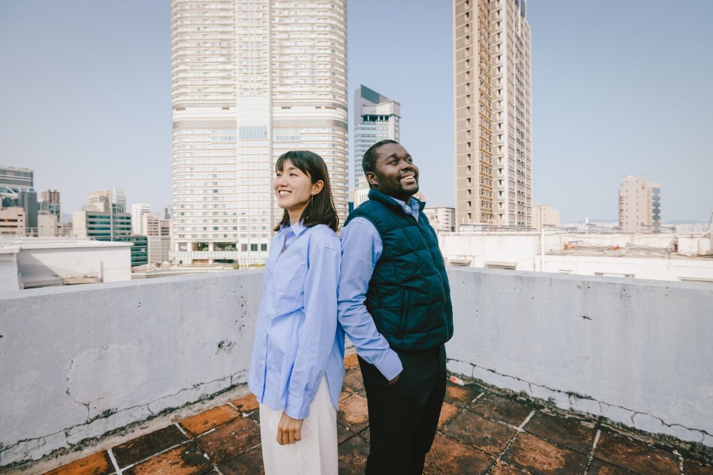 Innocent and Chihiro Mutanga on the rooftop of Chungking Mansions, in Tsim Sha Tsui, the spot where they got engaged. Photo: Tracy Wong