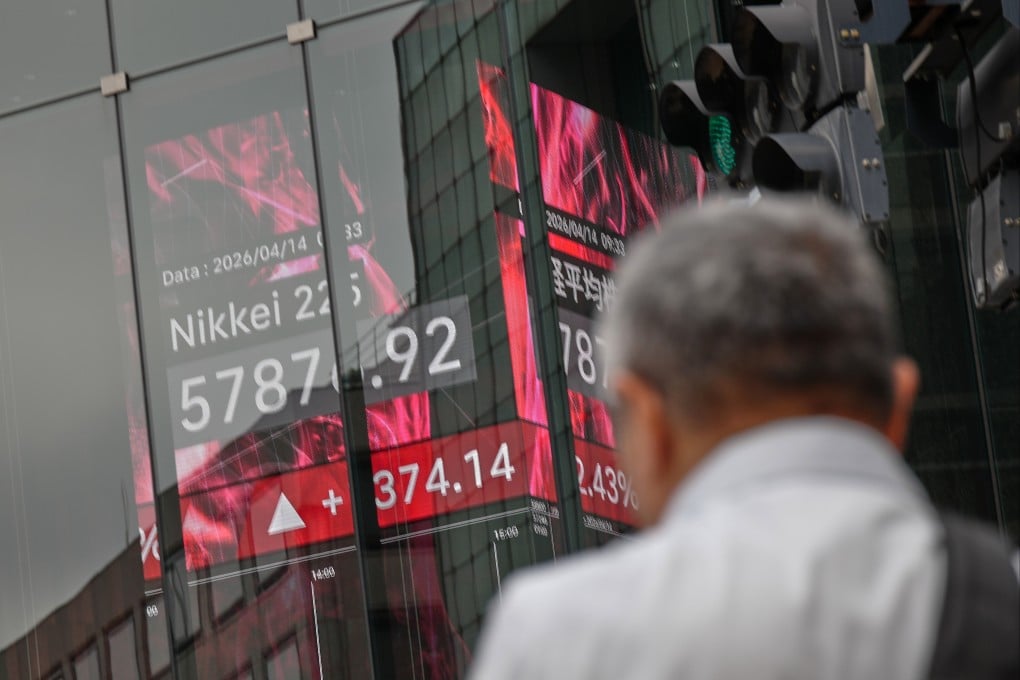 An electronic stock board showing Japan’s Nikkei index at a securities firm in Tokyo, April 14, 2026. Photo: AP