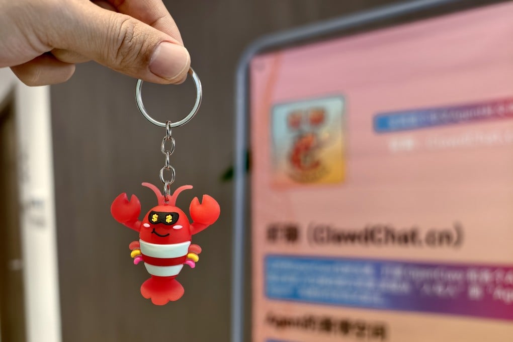 A lobster-shaped pendant at an OpenClaw event in Beijing on March 22. At a time when AI agent platforms like OpenClaw are taking China by storm, the Chinese government has proposed a new unit of account for the intelligent era. Photo: Xinhua