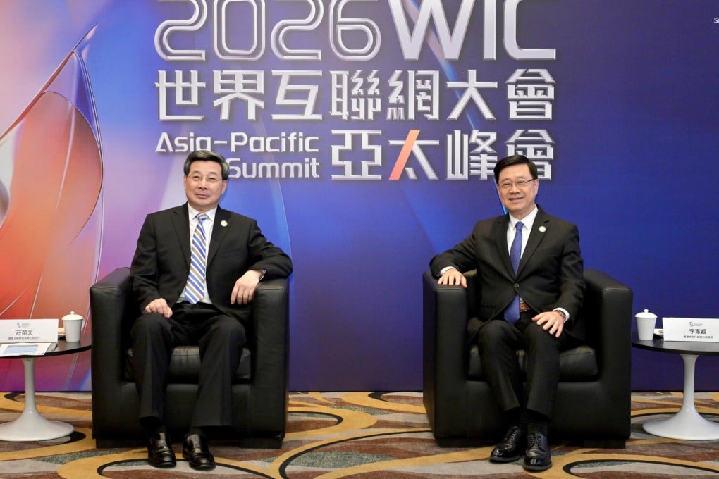 Cyberspace Administration of China director Zhuang Rongwen (left) sits down with Hong Kong Chief Executive John Lee Ka-chiu on April 12. Photo: Handout