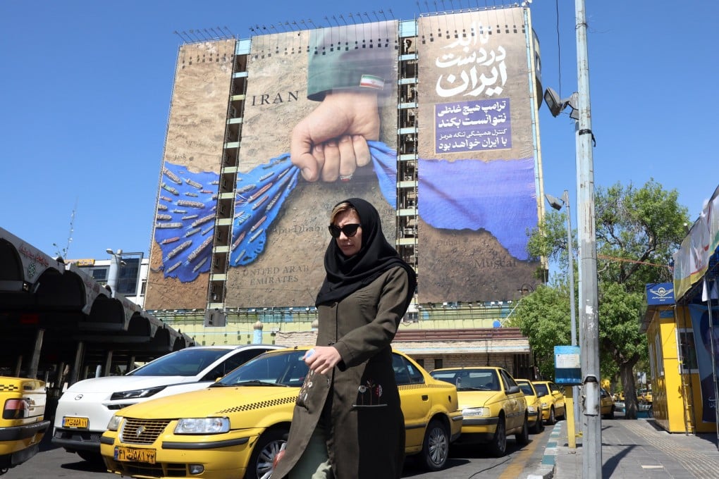 “Forever in Iran’s hand”, a large billboard proclaims in Persian in a reference to the Strait of Hormuz, in Tehran on April 15. Photo: EPA