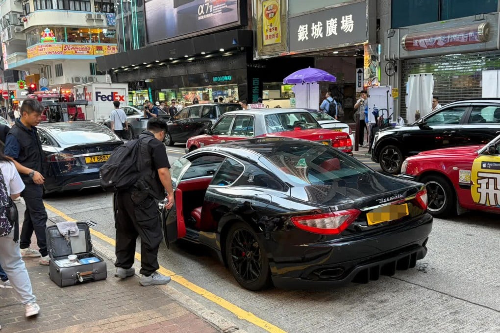 Hong Kong police intercept the Maserati on a busy street in Mong Kok on Wednesday. Photo: Handout