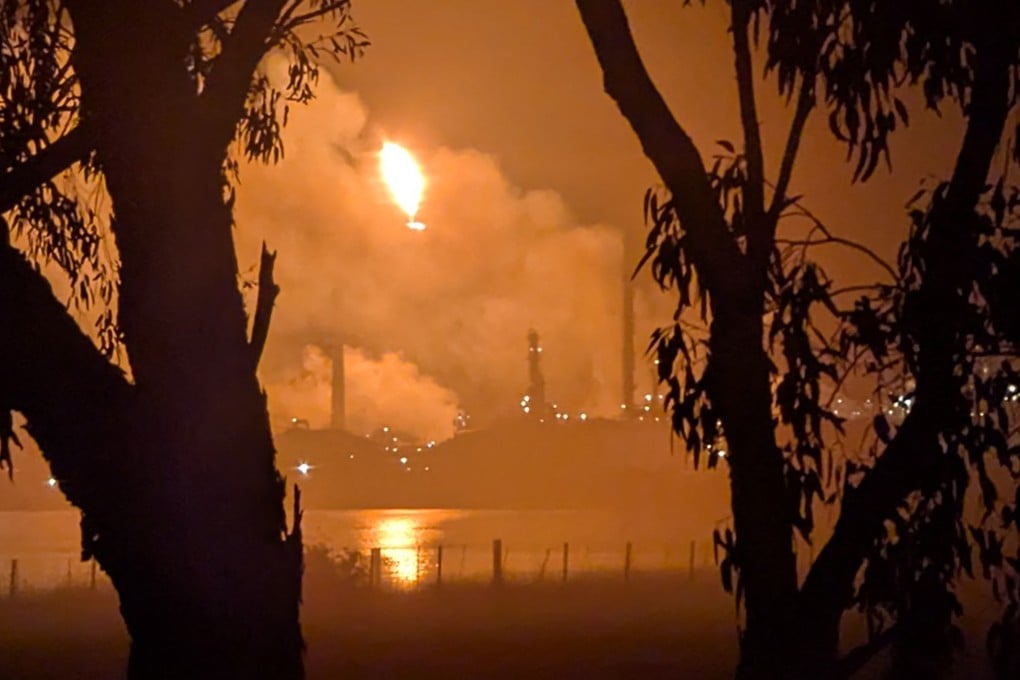 Flames shoot out from the Viva Oil Refinery in Geelong early Thursday morning. Photo: Handout/Giuliana Elakis/AFP