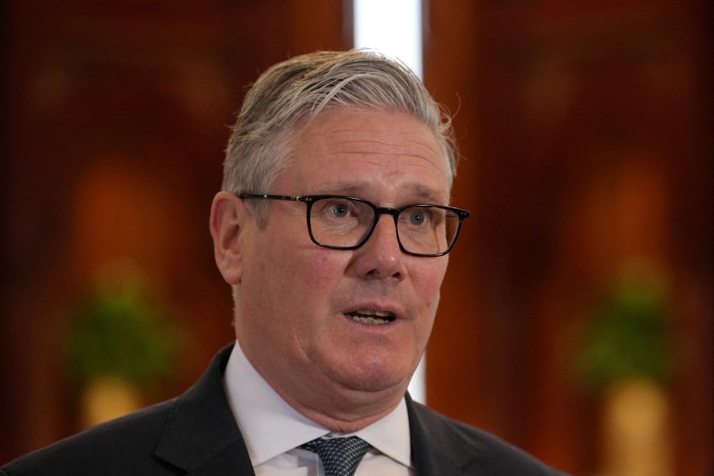 Britain’s Prime Minister Keir Starmer speaks to the media at the airport in Doha, Qatar, on April 10. Photo: Reuters