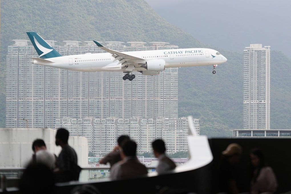 A Cathay Pacific Airways plane approaches Hong Kong International Airport. Photo: Eugene Lee