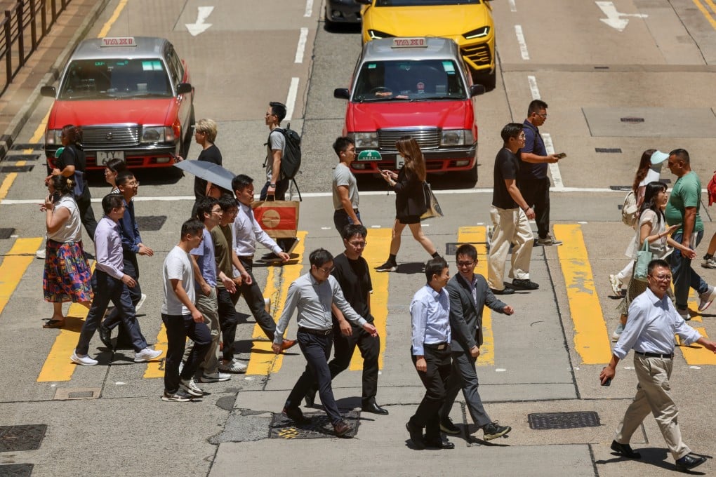 Pedestrians cross a road in Tsim Sha Tsui on August 26 2025. Photo: Jelly Tse
