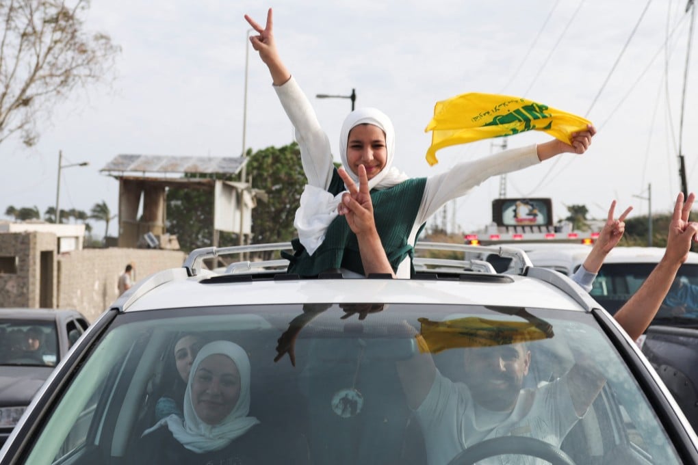 Displaced people make their way back to their home on Friday crossing the bridge in Qasmiyeh linking southern Lebanon to the rest of the country as a 10-day ceasefire between Lebanon and Israel went into effect. Photo: Reuters