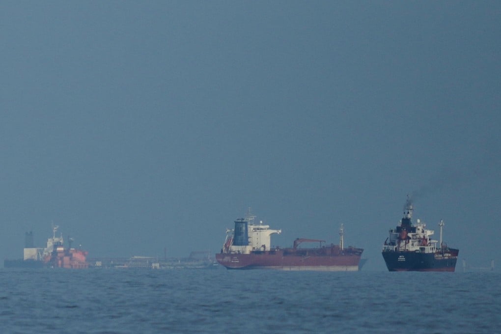 Oil tankers and cargo ships line up in the Strait of Hormuz as seen from Khor Fakkan, the United Arab Emirates, last month. Photo: AP