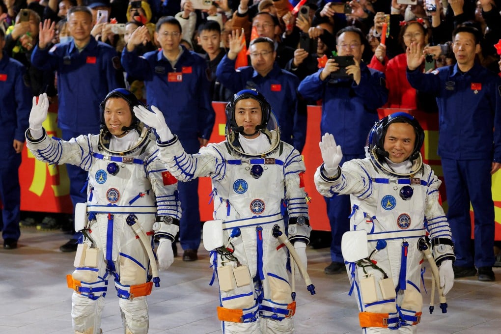 Astronauts Zhang Hongzhang, Wu Fei and Zhang Lu pictured before Shenzhou-21 was launched in October. Photo: Reuters