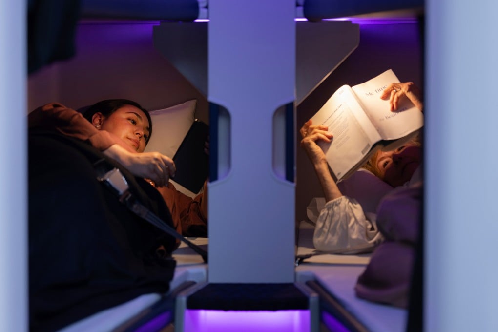 Air New Zealand unveils sleeping pods in a mock-up of a plane cabin in Auckland. Photo: Air New Zealand/AP