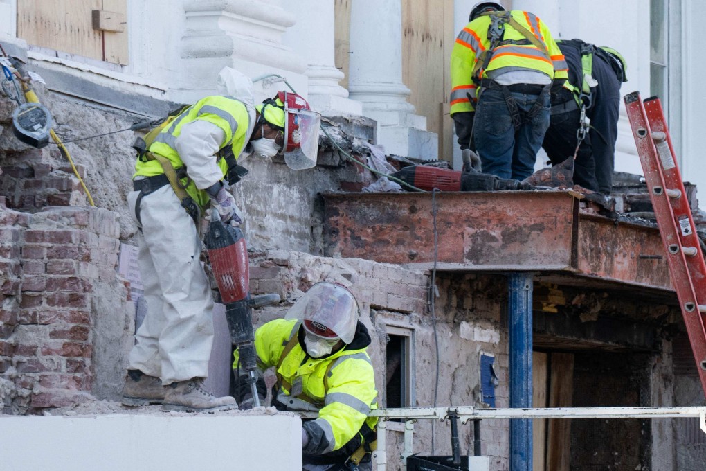 Construction workers  the East Wing of the White House in preparation to build a new ballroom on December 1, 2025. Photo: AFP