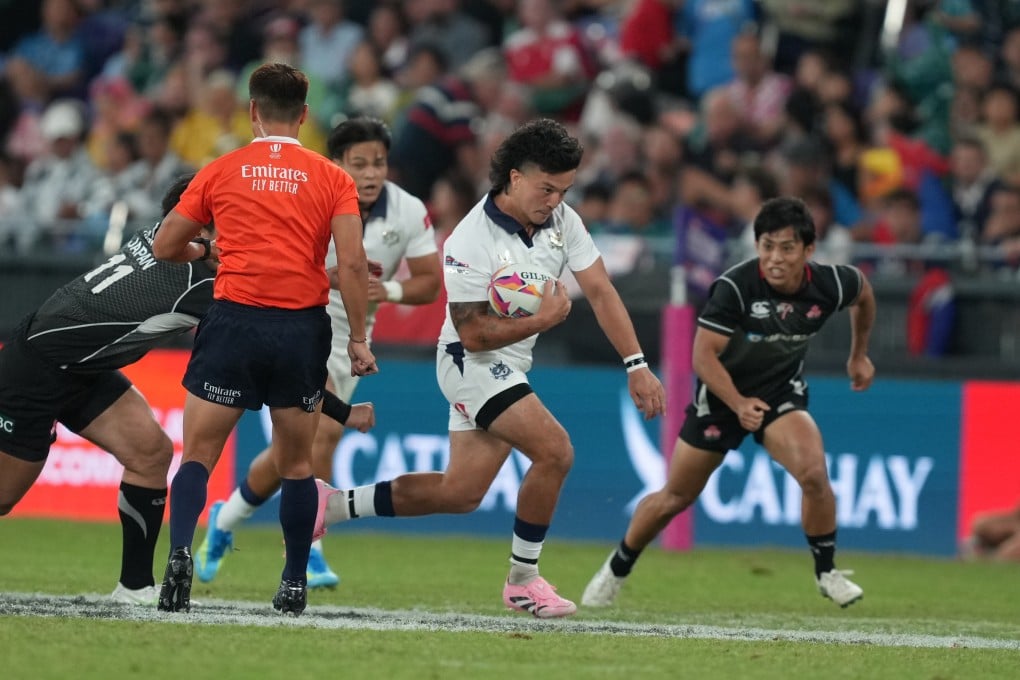 James Christie (centre) tries to take the attack to Japan during Hong Kong’s Melrose Claymores defeat. Photo: Sam Tsang