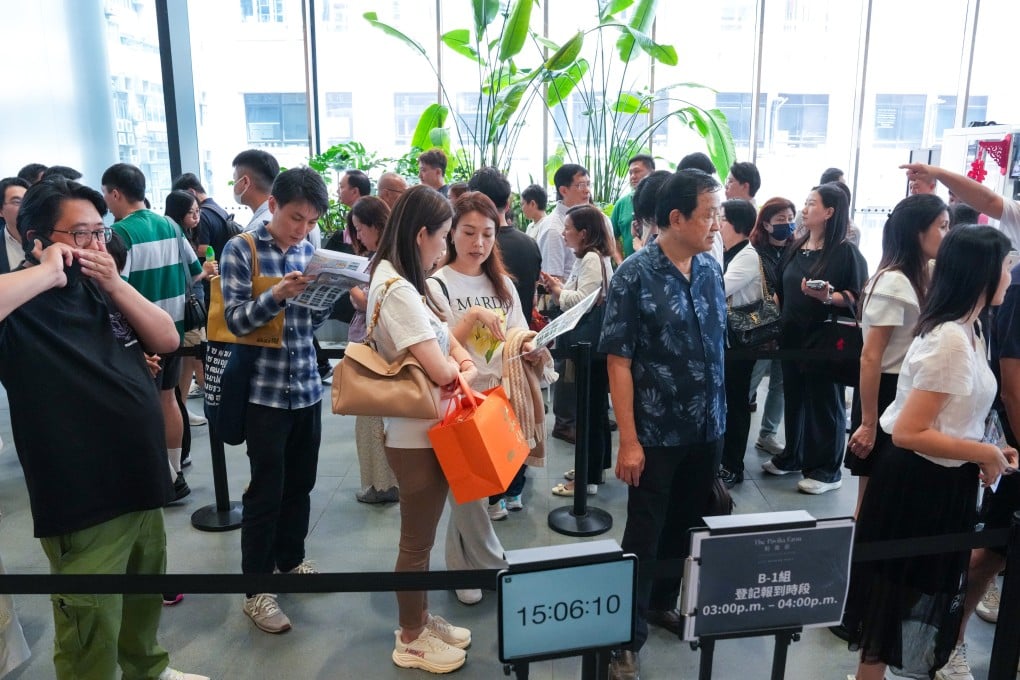 Prospective buyers queue at the Lai Chi Kok sales office of The Pavilia Farm III to secure flats at the Tai Wai Station development on Saturday. Photo: Jelly Tse