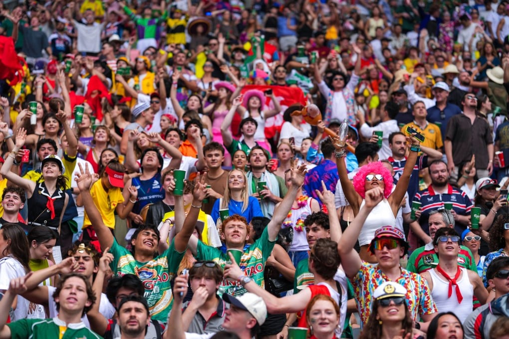Fans are in high spirits in a packed South Stand. Photo: Elson Li