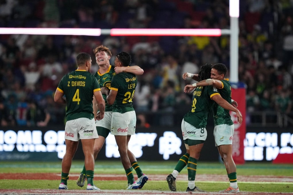 South Africa players celebrate winning the Hong Kong Sevens for the first time. Photo: Sam Tsang