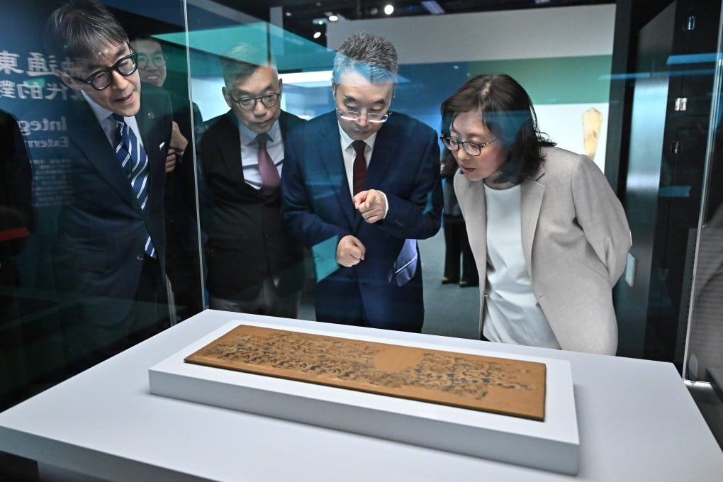 Secretary for Development Bernadette Linn (right) views a Han dynasty artefact. Photo: Handout