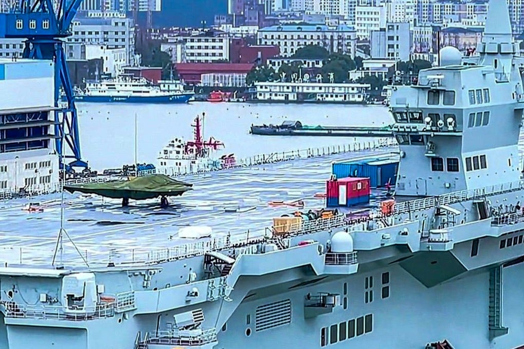 A GJ-21 stealth drone pictured on the deck of the Sichuan amphibious landing ship. Photo: Handout