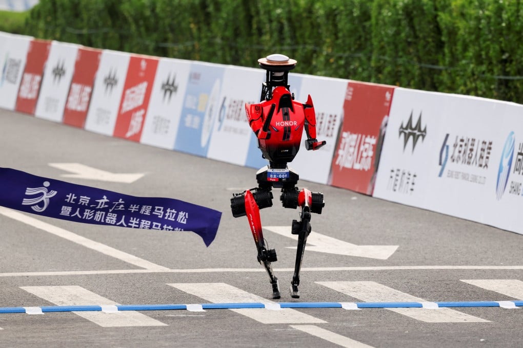 The winning robot crosses the finishing line. Photo: Reuters