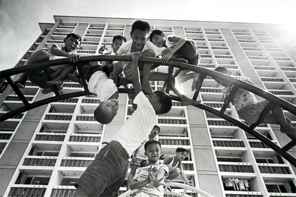Children play on an iron climbing frame in the new Wah Fu Estate, 1968. Photo: SCMP Archives