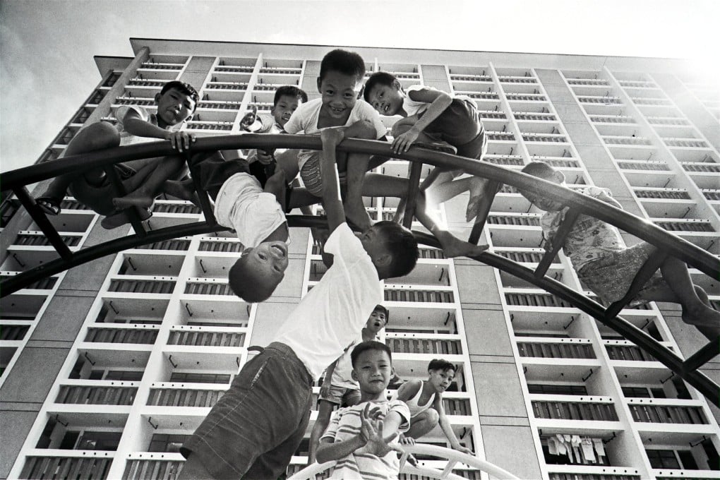 Children play on an iron climbing frame in the new Wah Fu Estate, 1968. Photo: SCMP Archives