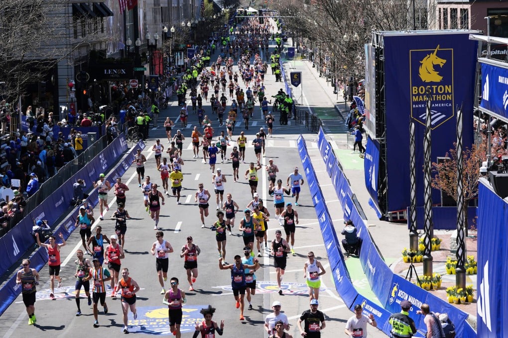 Runners approach the finish line for the 2025 Boston Marathon. Photo: AP