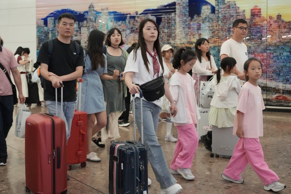 Tourists arrive in Hong Kong via the West Kowloon high-speed rail terminus. Photo: May Tse