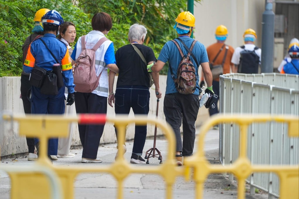 Wang Fuk Court residents return to their units on April 20, nearly five months after the deadly blaze. Photo: Eugene Lee