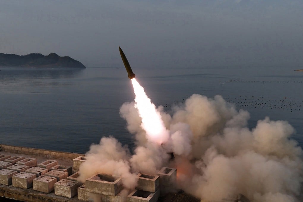 The test-fire of an improved Hwasongpho-11 Ra surface-to-surface tactical ballistic missile at an undisclosed location in North Korea on Sunday. Photo: EPA/KCNA