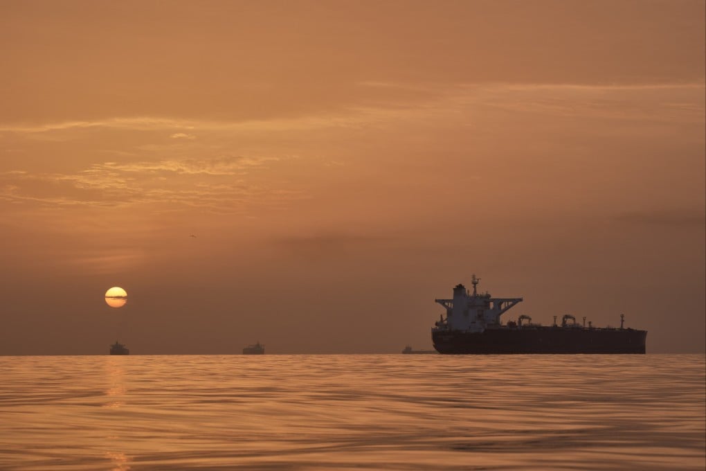 The sun rises behind tankers anchored in the Strait of Hormuz off the coast of Qeshm, an island in Iran, on April 18. Photo: AP