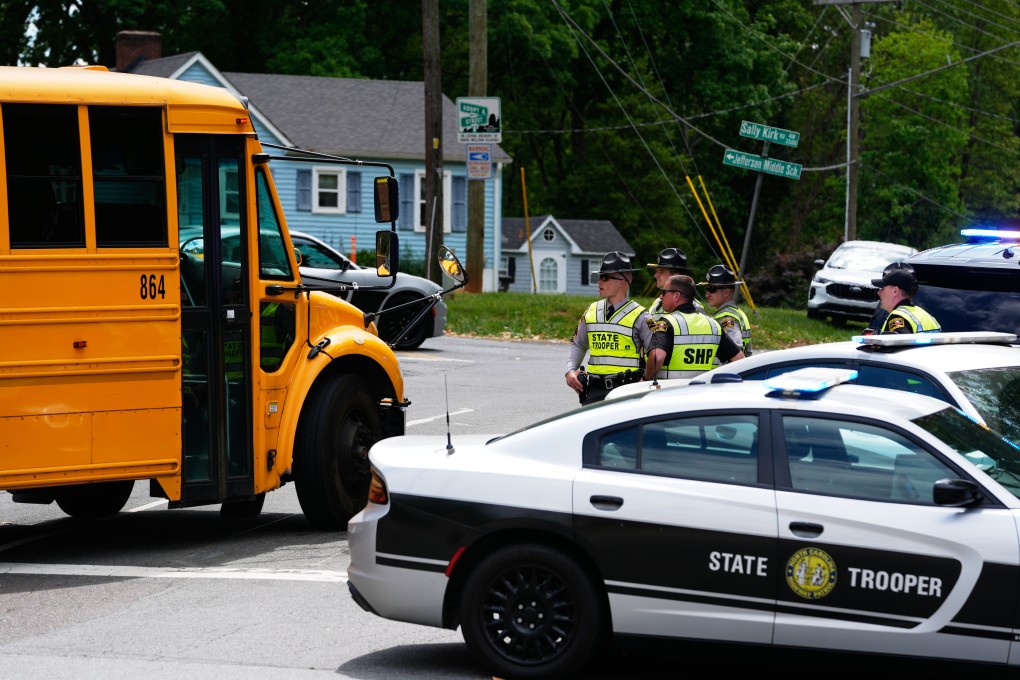 Police officers stand near the scene of a shooting at Leinbach Park on Monday in Winston-Salem, North Carolina. Photo: AP