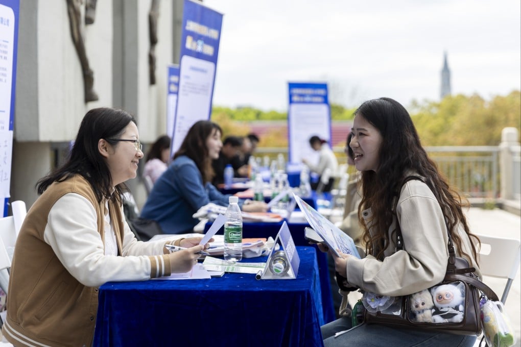A jobseeker meets with a recruiter at a job fair in Shanghai on April 9. The job fair was for aged-care services. Nearly 50 organisations and enterprises offered more than 100 opportunities. Photo: Xinhua