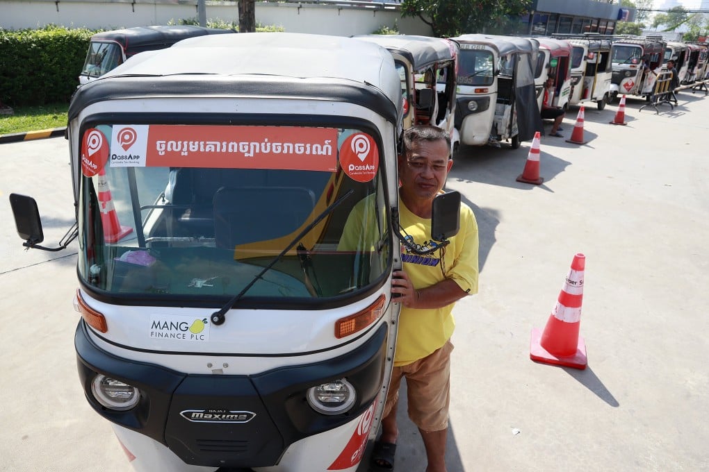 Vehicles line up to fill LPG at a fuel station in Phnom Penh, Cambodia, last month. Photo: EPA