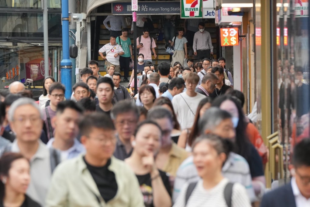 People head to work during the morning rush hour in Kwun Tong on October 14, 2025. Photo: May Tse