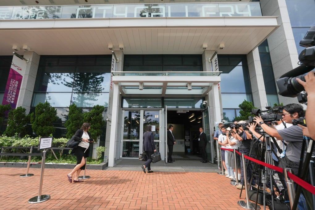 Members of the media wait outside City Gallery in Central. Photo: Sun Yeung