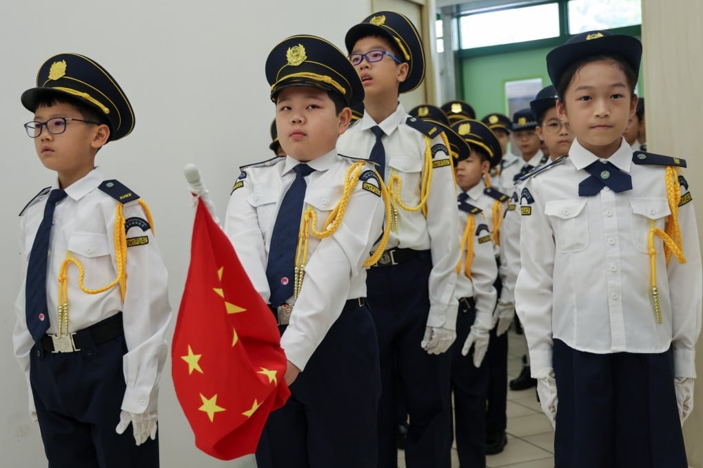 Students of Tai Po Old Market Public School hold a flag-raising ceremony on the first day of school on September 1, 2025. Photo: Jelly Tse