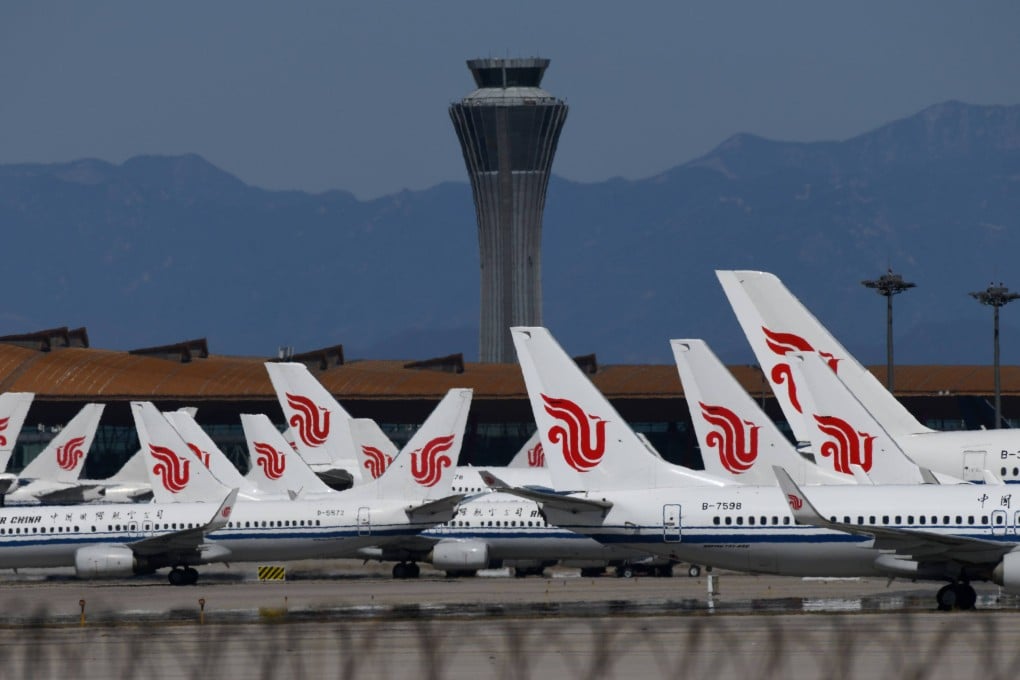 Air China planes are seen parked on the tarmac at an airport in Beijing in 2020. Photo: AFP