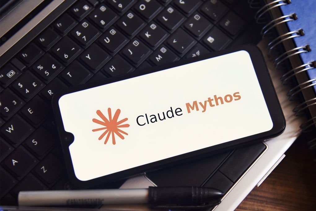 The Claude Mythos logo is displayed on a smartphone screen in this arranged photograph. Photo: Dreamstime/TNS