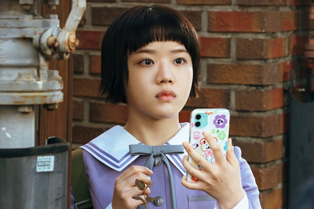 Kim Hyang-gi as Yeo Ui-ju, a high school student who writes boys’ love web novels featuring characters based on her attractive teachers, in a still from the new Prime Video K-drama Absolute Value of Romance.