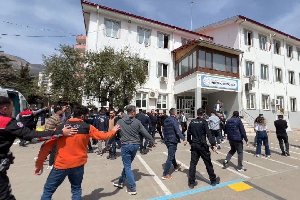 Police officers in uniform and plainclothes police secure the site after a deadly school shooting, in the southeastern province of Kahramanmaras, Turkey, on April 15, 2026. Photo: via Reuters