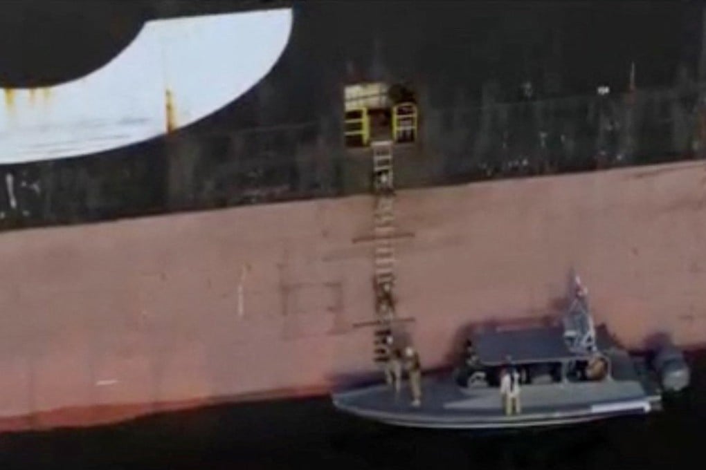 Iranian forces boarding a container ship on Wednesday. Photo: IRIB via Reuters