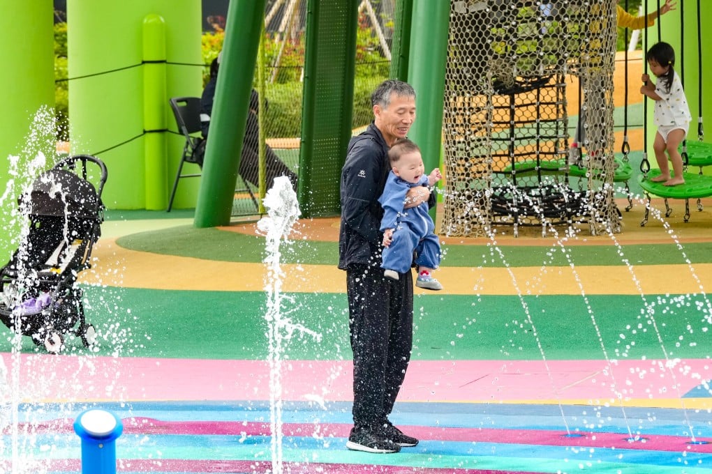 Children and their carers spend time at a playground in Kai Tak Sports Park on February 23. Photo: Jelly Tse